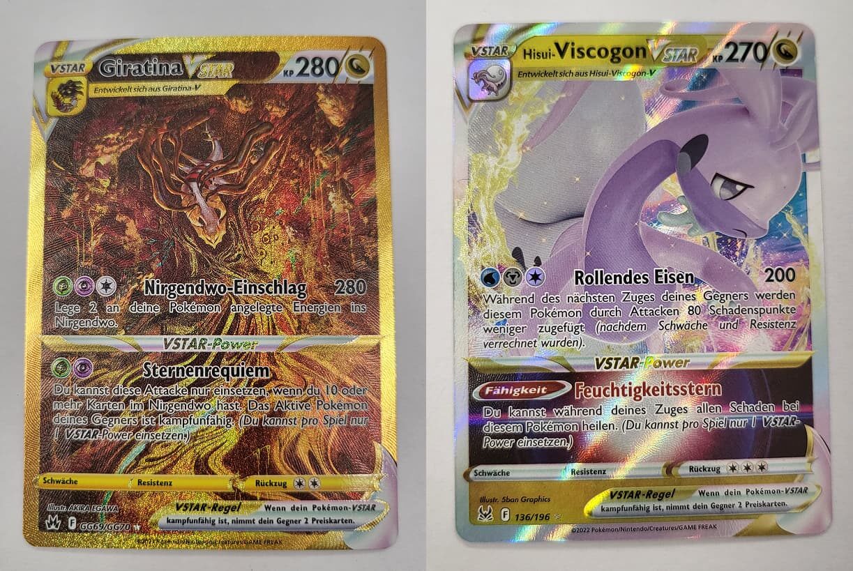 Zwei Pokémon-VSTAR-Karten nebeneinander: Links Giratina VSTAR mit 280 KP, einem gold-schimmernden Design und der mächtigen Attacke ‚Nirgendwo-Einschlag‘. Rechts Hisui-Viscogon VSTAR mit 270 KP, einem lila-dunklen Design und der Fähigkeit ‚Feuchtigkeitsstern‘. Beide Karten haben ein holografisches Finish und gehören zur VSTAR-Kategorie.